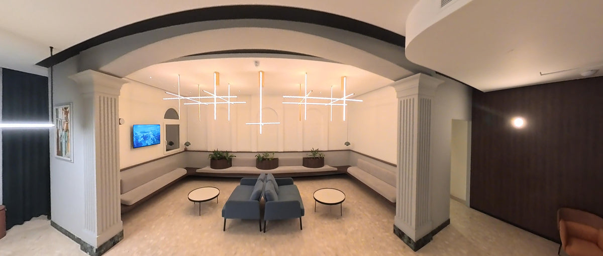 Il Palazzin hotel lobby in Malta, with seating and pendant lights